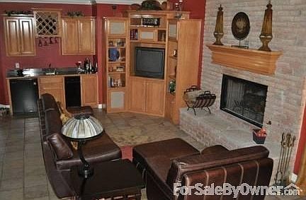 Hearth Room
						:
						Woodburning fireplace, wet bar, built-ins adjoin large kitchen