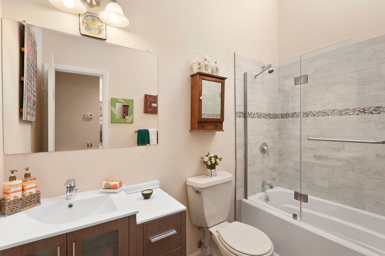  Renovated Bathroom with Vaulted Ceiling and Skylight