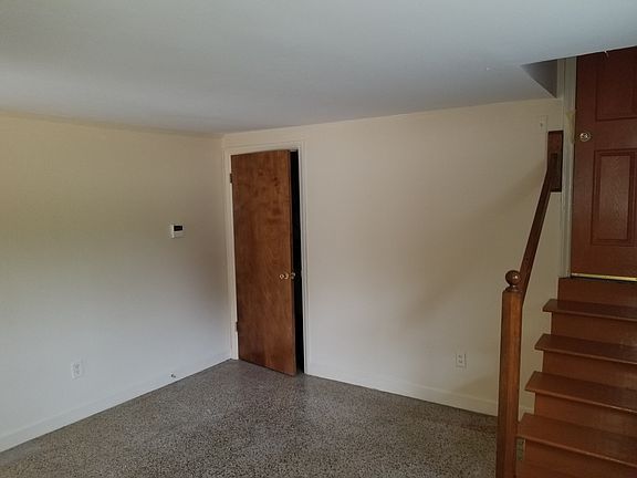 Living Room with door to utility closet