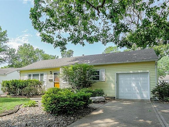 New garage door and parking pad for additional car