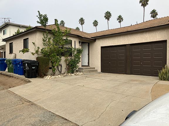 One car garage parking, one Driveway parking space and additional parking by house patio