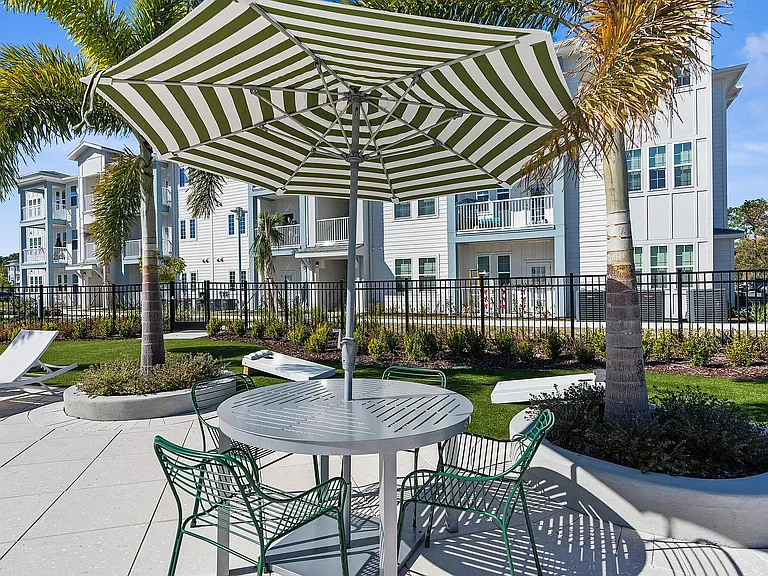 Relax in the elegant outdoor space, perfect for leisurely afternoons under the sun.