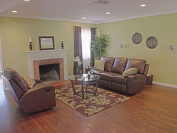 Living room with fireplace and recessed lights