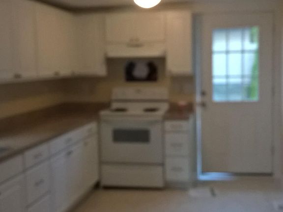 remodeled and large kitchen with loads of counter bspace