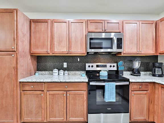 Kitchen with all stainless steel appliances.