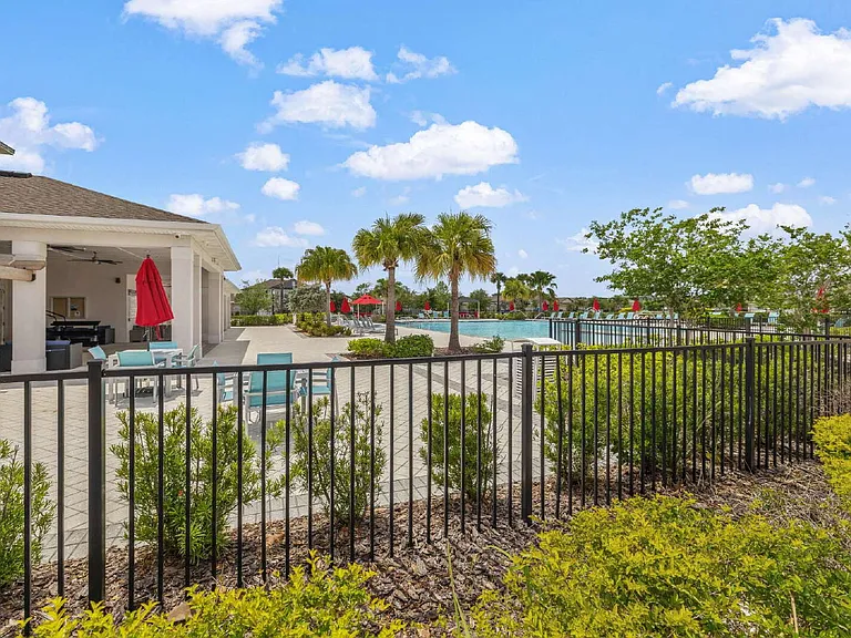 7407 Rosy Periwinkle Ct — Photo 28