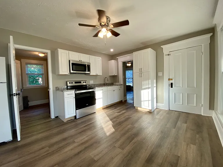 Kitchen with full bath and back bedroom access.