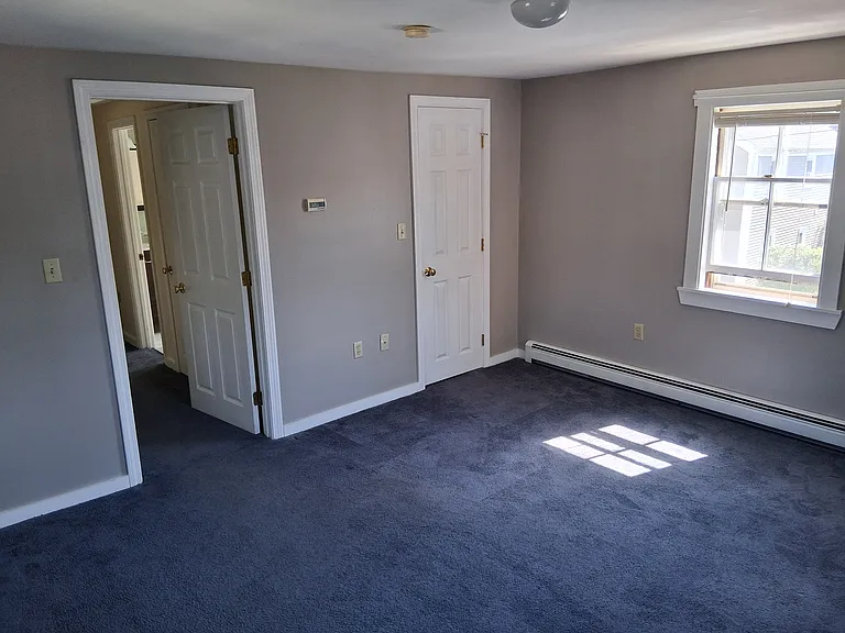 Bedroom #2 with one closet.