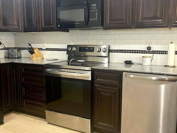 New oven & dishwasher. Less than 1 year old.
