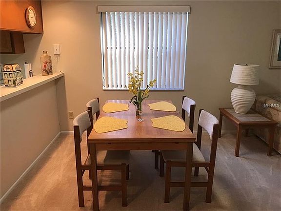 Dining area; note the BRAND NEW CARPET