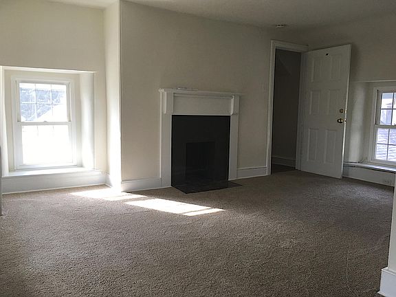 Family room with faux fireplace