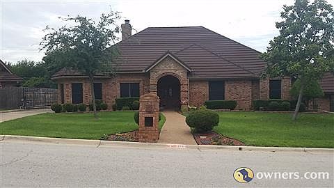 Front View of House w/ Gate