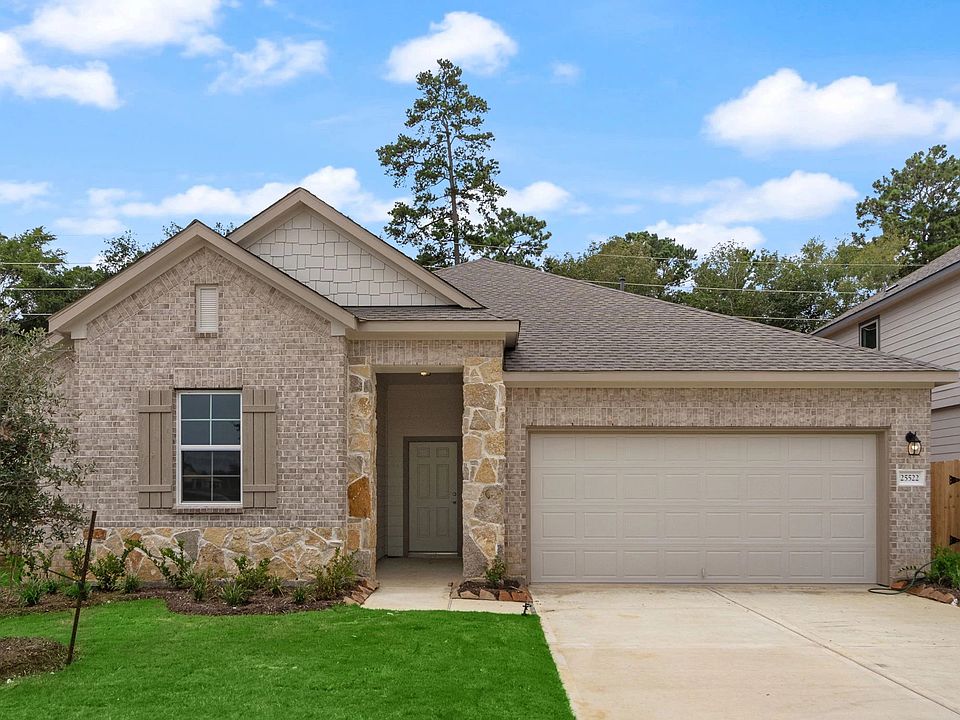 Welcome home to 25522 West Blackwater Creek Trail located in the community of Spring Creek Trails an