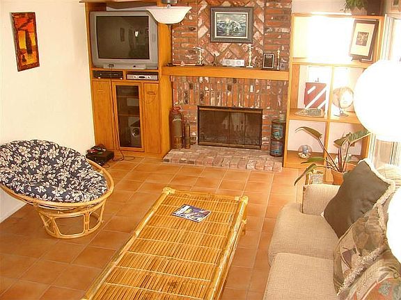 Family Room With Brick Fireplace