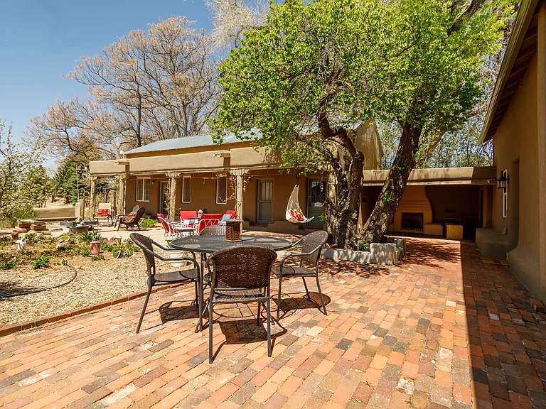 Huge rear patio w/ lots of seating (shared with Casa Manzana in background). Casa LaVina on the right.