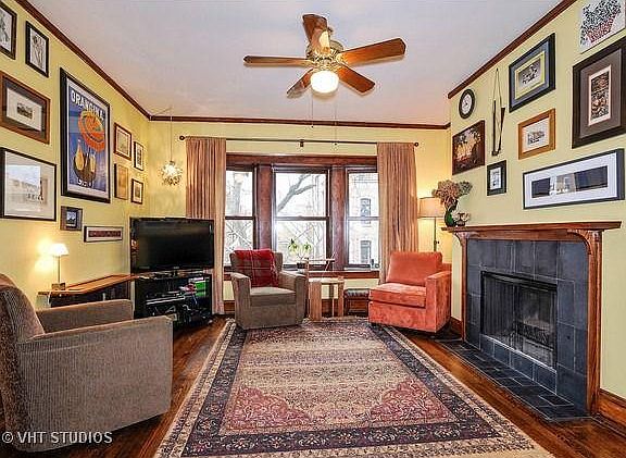 Living room - Wood burning fireplace w/ gas starter