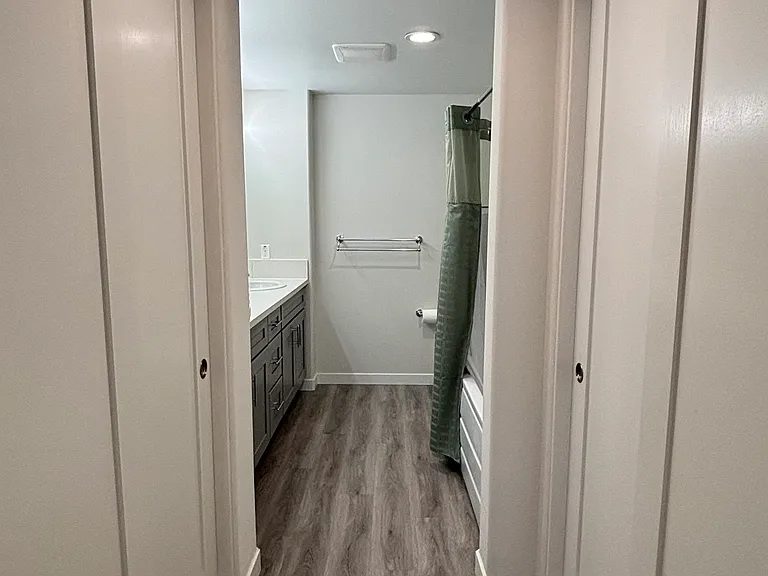 Private Master Bedroom: Closets & Hallway to Ensuite Bathroom