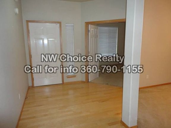 Foyer with hardwood floor