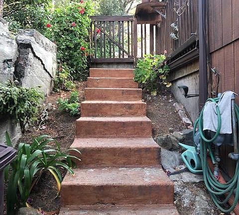 Stair to the apartment, the unit in downstairs to the side of the mainhouse.