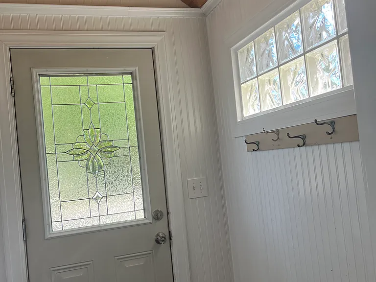 Tiled Mud room entrance.