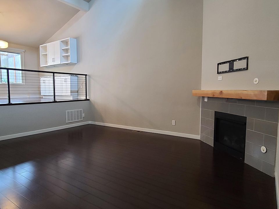 Relax by the gas fireplace in the living room