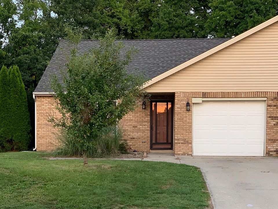 Your own place! Backs up to trees, and with both attached garage and off street parking.
