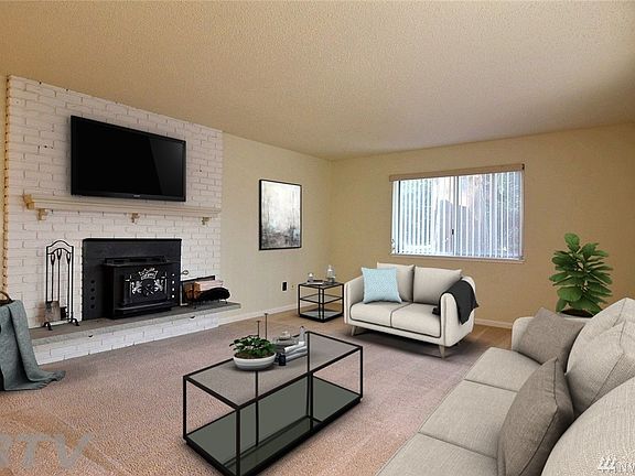 Living Roon w/ Wood Stove - Virtually Staged