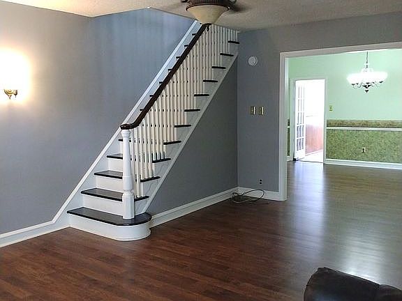Living room view to stairs