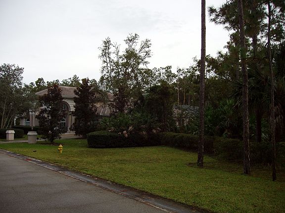 Front right of home next to retention pond