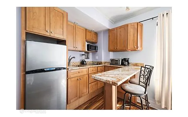 Rented by Douglas Elliman | media 17