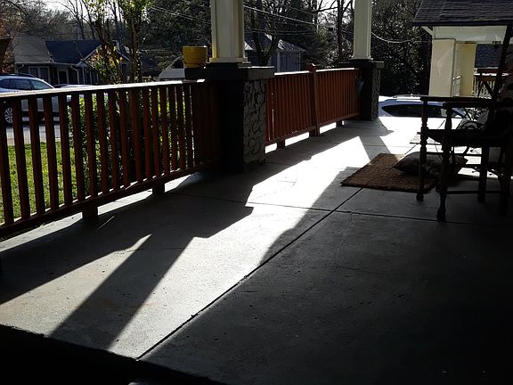 Rocking chair covered front porch