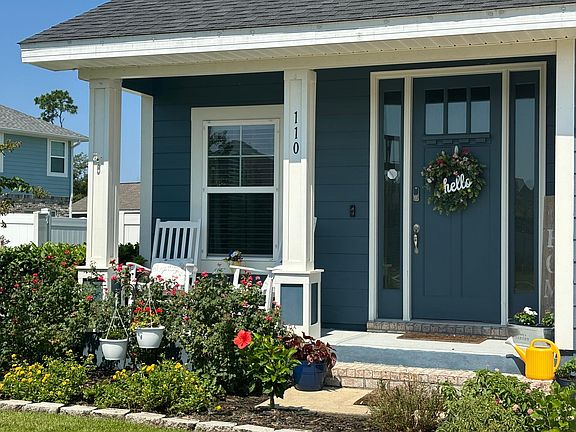 Close up of front door and porch .