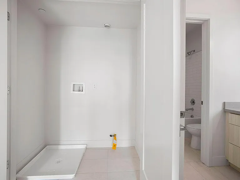 Upstairs full-sized laundry room