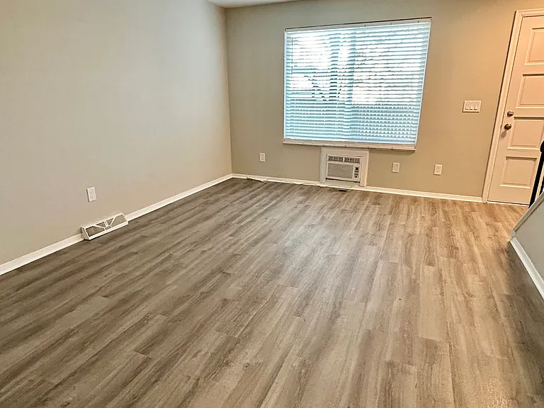 Step into this inviting living space with elegant flooring and ample natural light. Step into this inviting living space with elegant flooring and ample natural light.