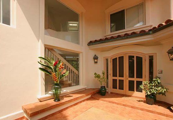 Double door entry with custom screen door