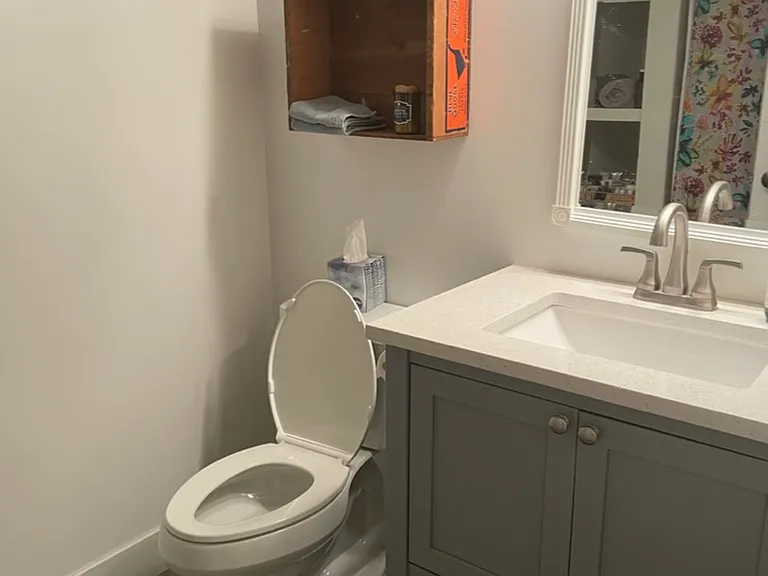 Bathroom with standup shower in finished basement