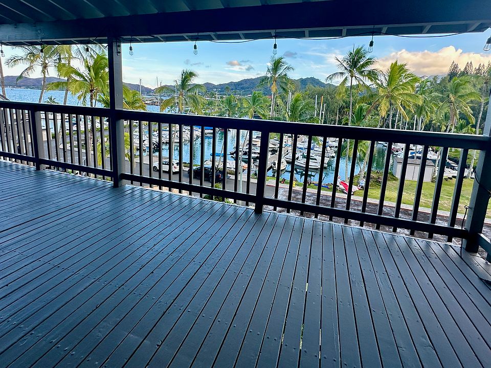Living room Lanai with marina and ocean view