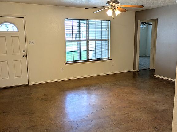 Living area, stained concrete floor
