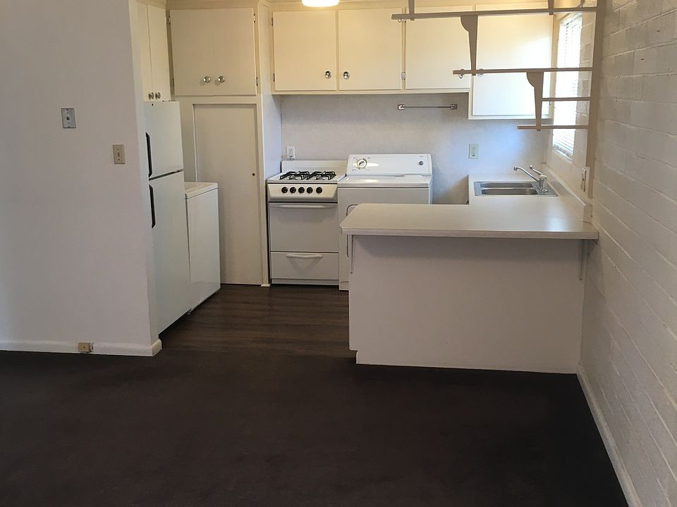 Living room looking into kitchen