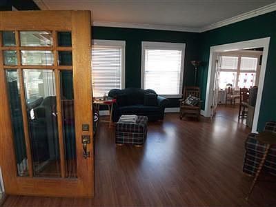 Huge Living Room thru this beautiful beveled glass door.