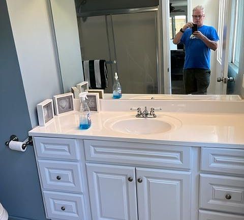 bathrooom with tub and shower
