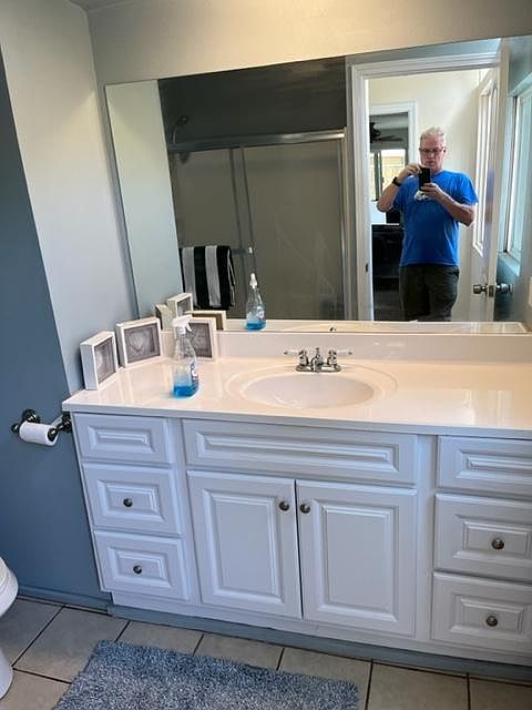 bathrooom with tub and shower