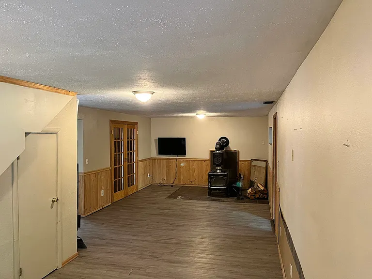 Downstairs living area with fireplace.