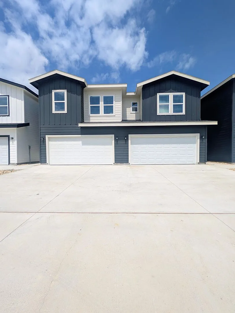 Brand New Duplex in New East Parks Community — Photo 1