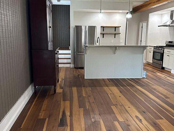 Open concept island kitchen area