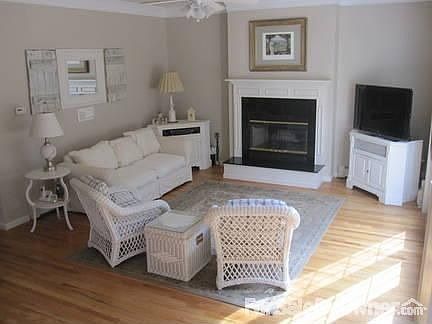 Family room with wood burning fireplace