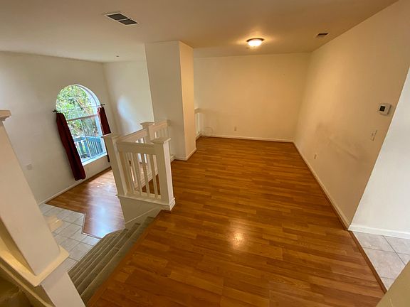 Separate Dining Room Overlooking Gathering Room and View of Tule Pond Park