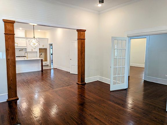 Freshly stained hardwoods throughout home