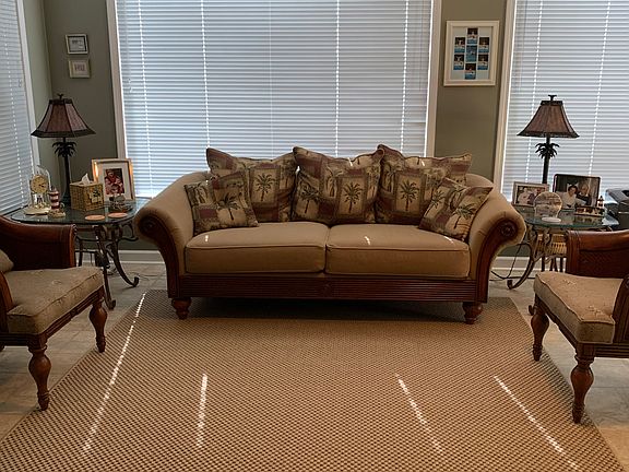 Large sunroom overlooks pool