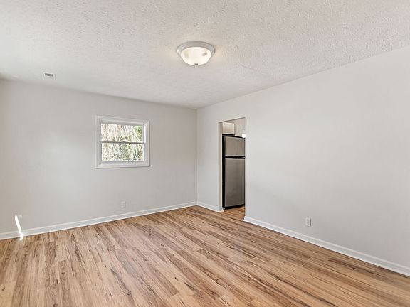 Living room facing kitchen